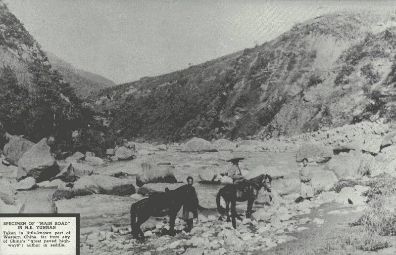 SPECIMEN OF "MAIN ROAD" IN N.E. YÜN-NAN

Taken in the little-known part of Western China, far from any of China's
"great paved highways"; author is in saddle.