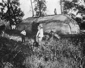 b. Long structure with entrance on one side

WINNEBAGO HABITATIONS, ABOUT 1870